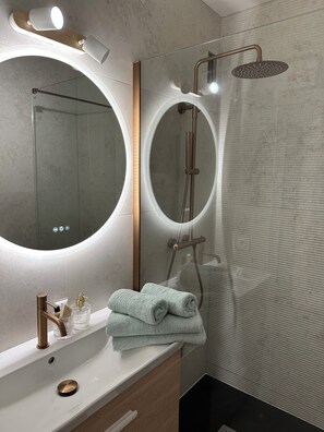 Hair dryer, towels, soap, toilet paper