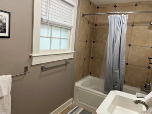 Jetted tub, towels, toilet paper