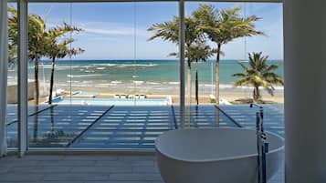Premium Villa, Beach View | In-room safe, desk, laptop workspace, blackout drapes