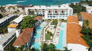 A resort with multiple swimming pools, a beachfront view, and a large building with balconies. - Lifestyle Holidays Vacation Club - Presidential Suites - 1 Bedroom suite (Cabarete)