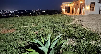 Self contained rooms with Beautiful View and pergola in the skyline of Mpigi.