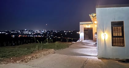 Self contained rooms with Beautiful View and pergola in the skyline of Mpigi.