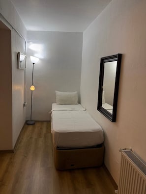 Desk, laptop workspace, blackout curtains, iron/ironing board