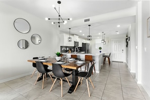Comfort Apartment | Dining room - Storey Lake condos by UNE Homes (Kissimmee)