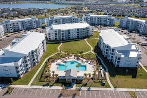2 outdoor pools - Storey Lake condos by UNE Homes (Kissimmee)