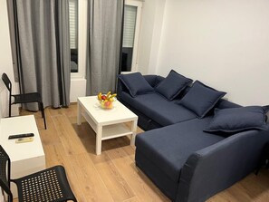 Desk, blackout drapes, soundproofing, iron/ironing board