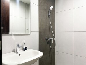 Standard Apartment | Bathroom - Homey And Nice Studio At Lrt City Bekasi Apartment (Bekasi)