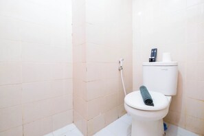 Standard Apartment | Bathroom - Simply Studio Room At Titanium Square Apartment (Jakarta)