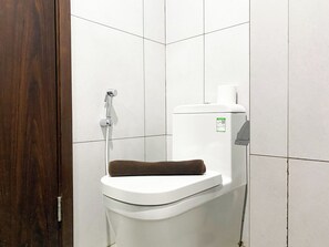Standard Apartment | Bathroom - Wooden Touch Studio At Lrt City Bekasi Apartment (Bekasi)