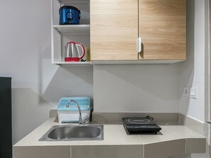 Apartamento standard | Cozinha privada | Talheres/pratos/utensílios de cozinha