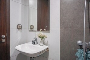 Standard Apartment | Bathroom - Cozy Look Studio Apartment At Lrt City Bekasi (Bekasi)