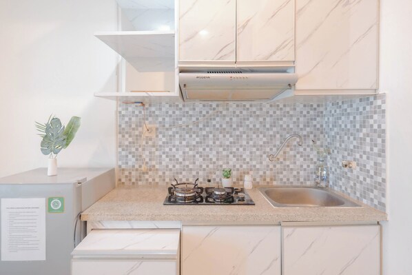 Apartamento standard | Cozinha privada | Talheres/pratos/utensílios de cozinha