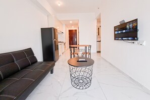 Living area - Tidy 2Br Sky House Alam Sutera Apartment Near Ikea (Tangerang)