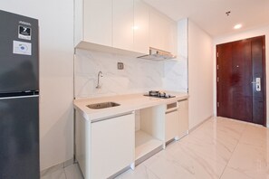 Apartamento standard | Cozinha privada | Talheres/pratos/utensílios de cozinha