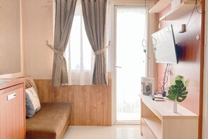 Apartamento standard | Área de estar