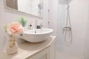 Standard Apartment | Bathroom - Wooden Accent Studio At Tokyo Riverside Pik 2 Apartment (Teluknaga)