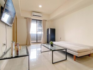 Standard Apartment | Living area - 3Br Meikarta Apartment Near Paramadina University (Cikarang)