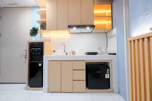 Deluxe appartement | Privékeuken | Kookgerei, borden en bestek