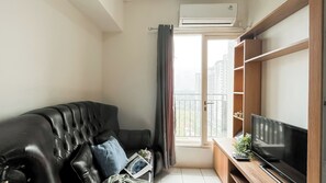 Apartamento Deluxe | Zona de estar