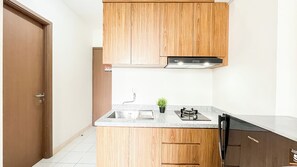 Apartamento Deluxe | Cocina privada | Utensilios de cocina