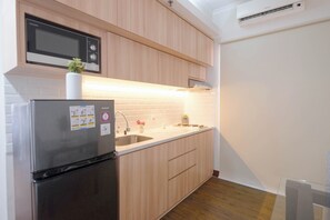 Apartament Deluxe | Cuina privada | Utensilis de cuina, vaixella i coberteria