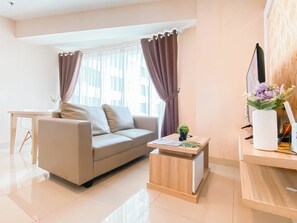Deluxe Apartment | Living area