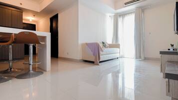 Departamento Deluxe | Área de sala de estar