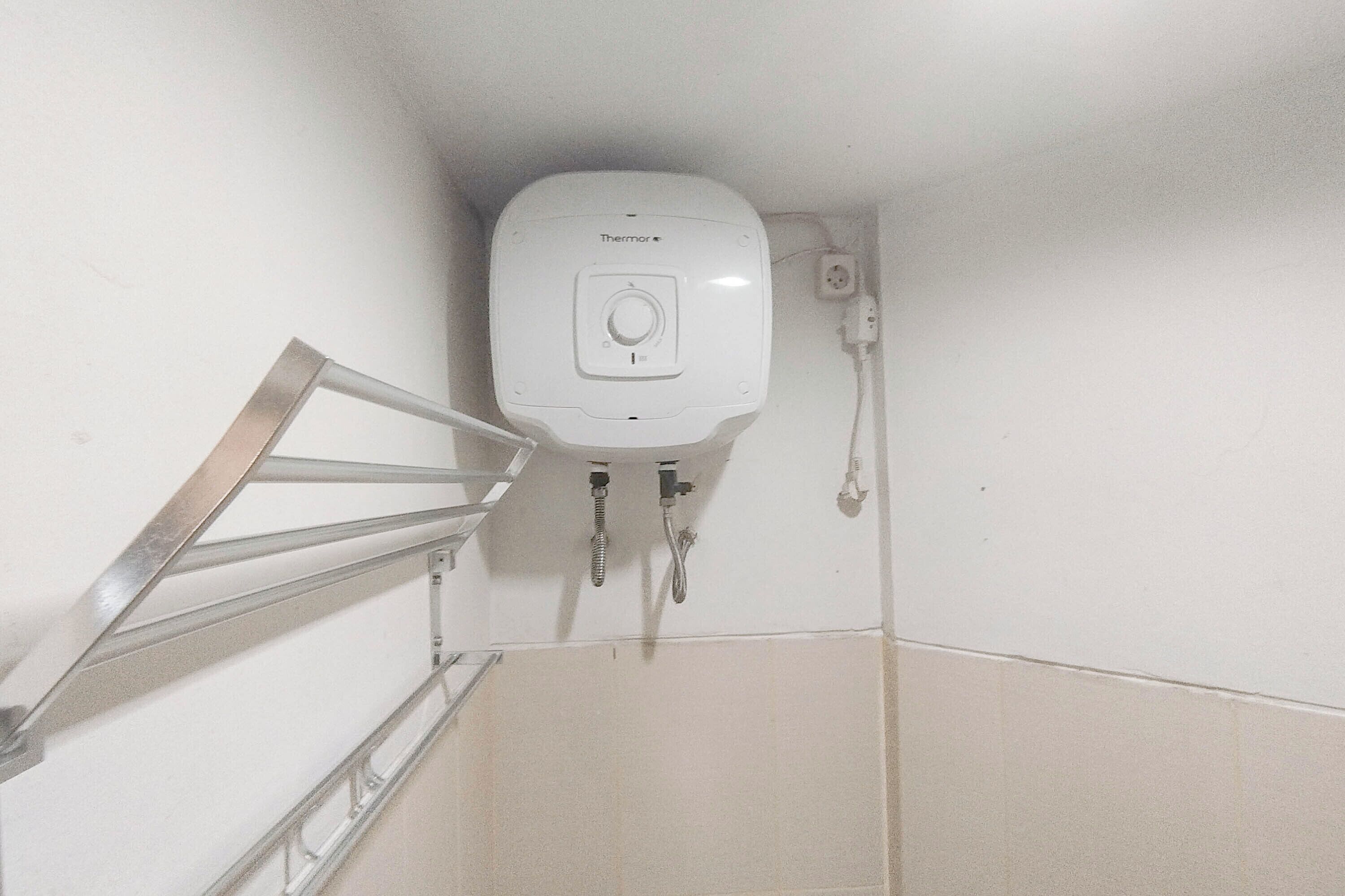 Apartemen Deluks | Kamar mandi | Shower, perlengkapan mandi gratis,  dan handuk