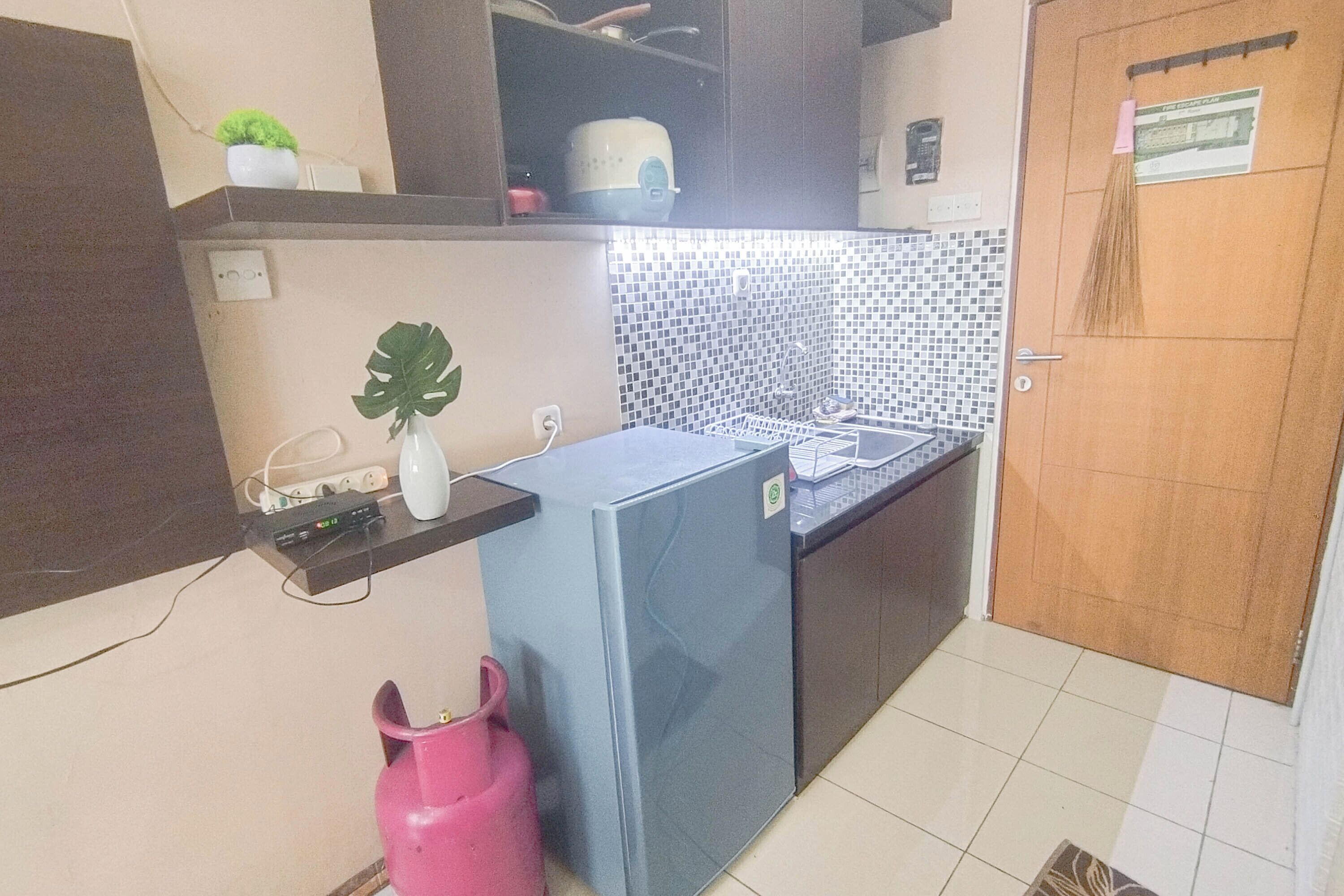 Apartemen Deluks | Dapur pribadi | Lemari es, kompor, dan peralatan masak/sendok-piring
