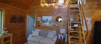Cozy and quaint, this 1-bedroom cabin w/ loft is a gem.