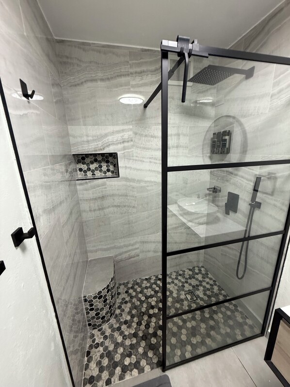 Hair dryer, towels, soap, shampoo