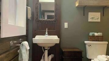 Shower, towels, toilet paper