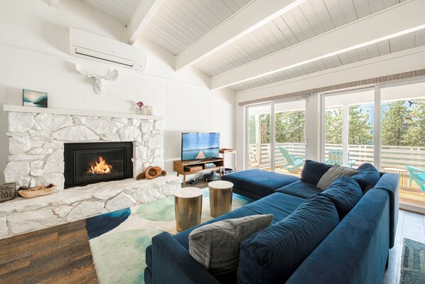 TV, fireplace - Bluejay Hideaway by Tahoe Getaways - Kings Beach 3BR, Pet Friendly w/ Yard, Hot Tub + Walk to Beach! (Kings Beach)