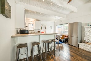 Fridge, microwave, oven, stovetop - Bluejay Hideaway by Tahoe Getaways - Kings Beach 3BR, Pet Friendly w/ Yard, Hot Tub + Walk to Beach! (Kings Beach)