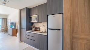 Fridge, microwave, stovetop, coffee/tea maker
