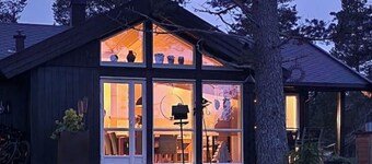 Cabin by the water – Jacuzzi & electric bicycles included