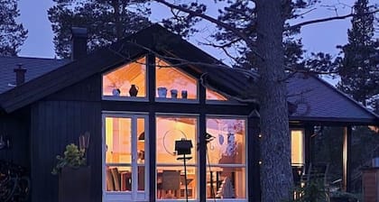 Cabin by the water – Jacuzzi & electric bicycles included