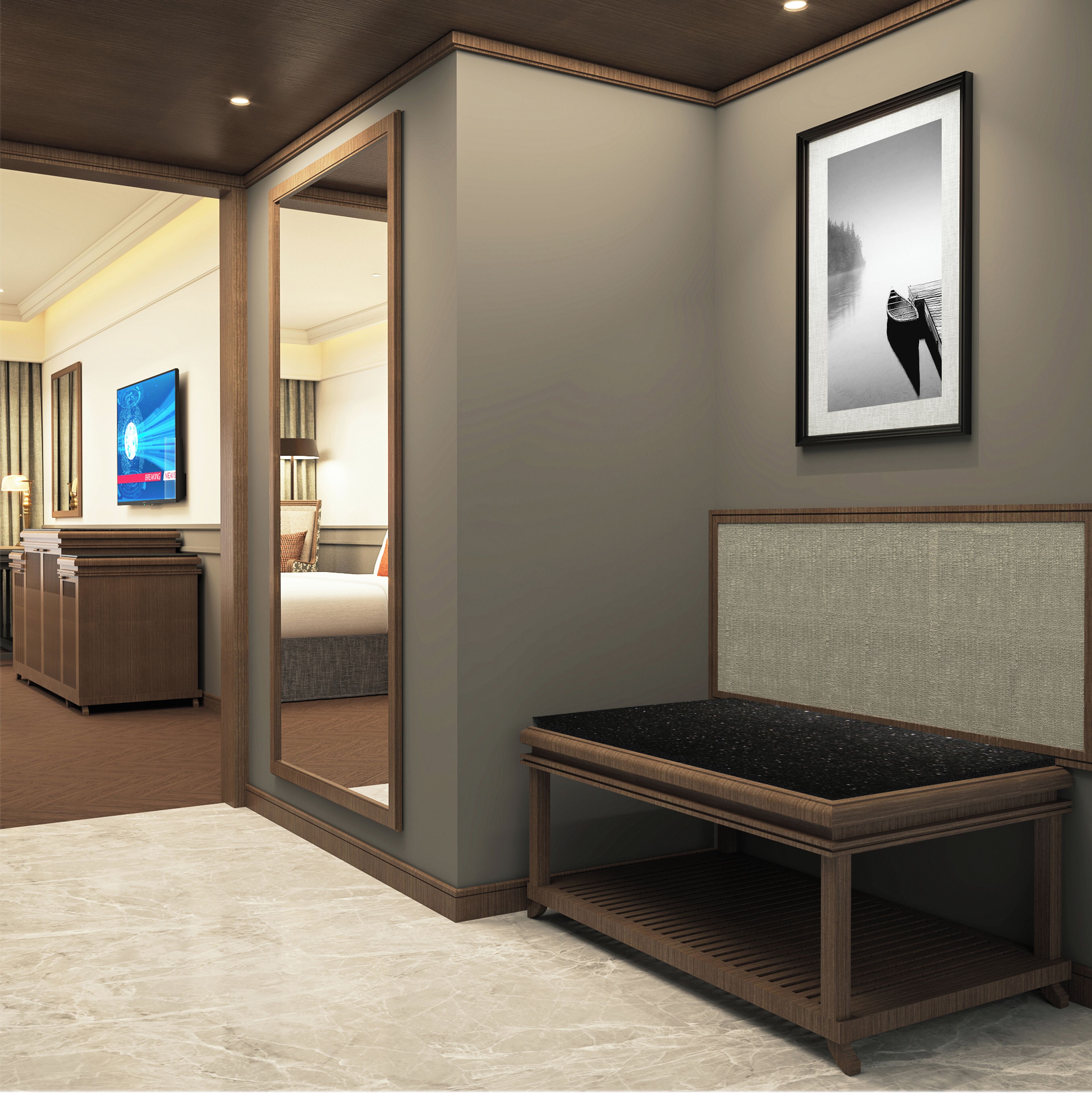A hotel room with a large mirror, a bed, a desk, and a framed picture on the wall.