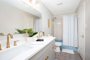 Hair dryer, towels, soap, shampoo