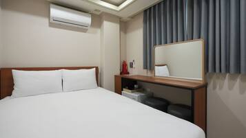 Habitación Business | Ropa de cama de alta calidad, sistema de insonorización, wifi gratis