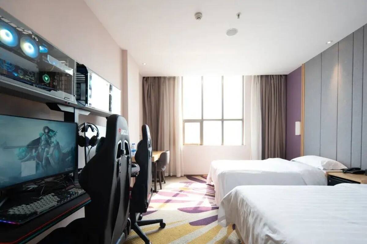Quarto duplo com design assinado, vista para a cidade | Vista do quarto