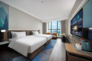 A hotel room with two beds, a desk, a TV, and a large window. - Echarm International Hotel Guangzhou Huangpu Flagship Branch (Guangzhou)