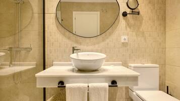 Hair dryer, towels, soap, toilet paper