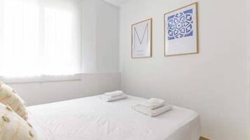2 dormitorios, tabla de planchar con plancha, Internet y ropa de cama