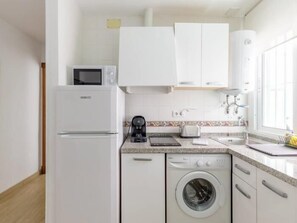 Fridge, microwave, coffee/tea maker, toaster