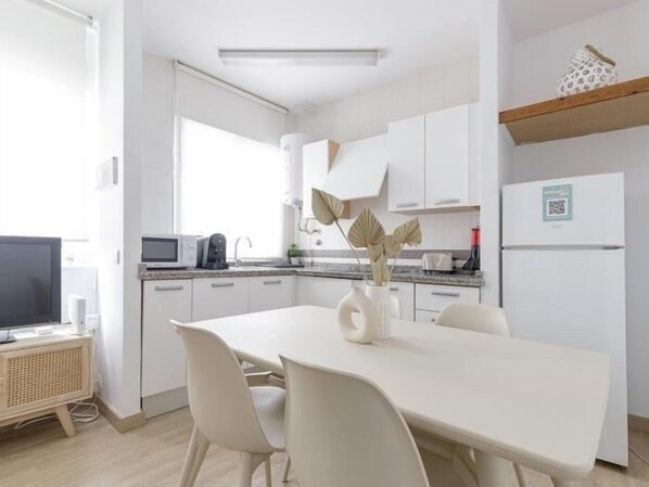 Fridge, microwave, coffee/tea maker, toaster