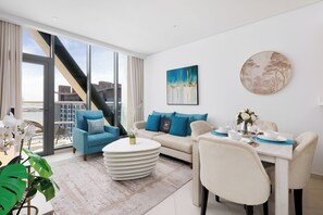 Deluxe Apartment, Sea View | Living area - Maison Privee - Elegant Palm Retreat w/ Iconic Sea and Marina Vws (Dubai)