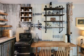 Microwave, coffee/tea maker, toaster, cookware/dishes/utensils