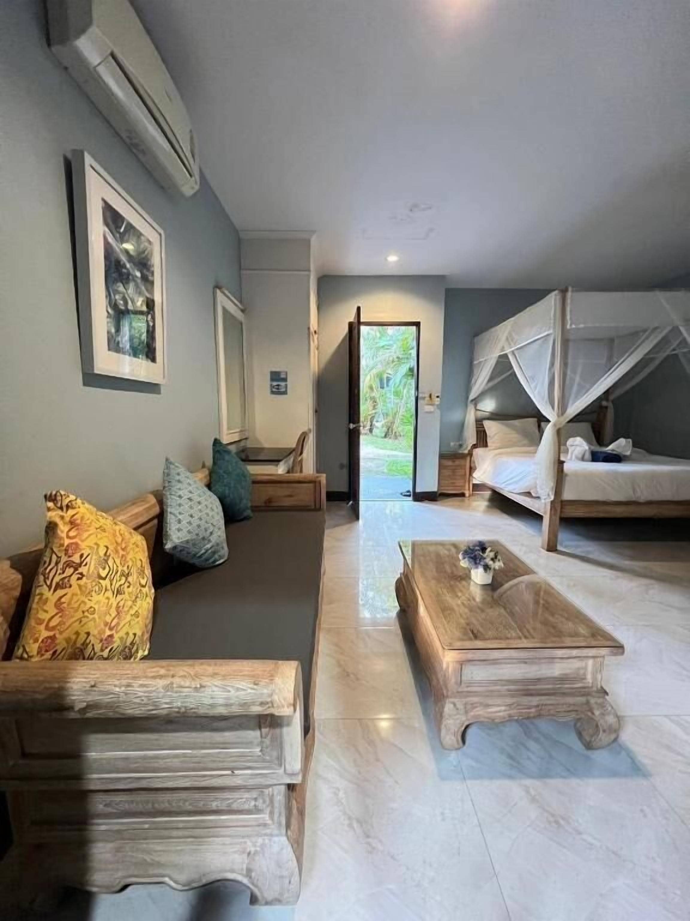 Superior Cottage, Courtyard View | In-room safe, desk, laptop workspace, blackout curtains