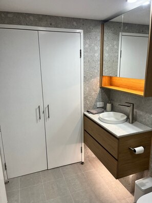 Hair dryer, towels, soap, shampoo